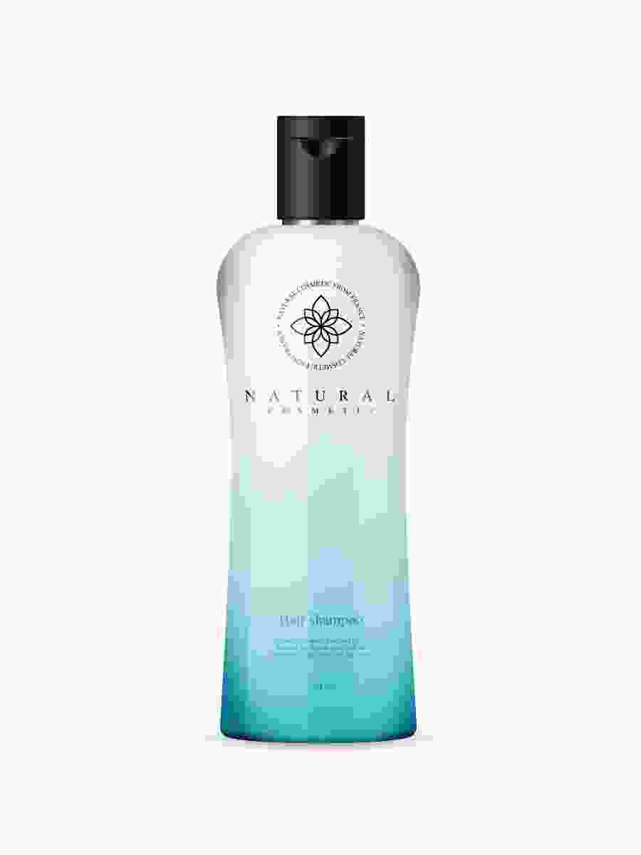 A bottle of body wash with blue and green design.